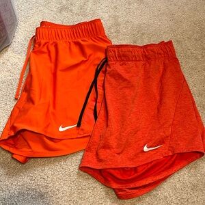 Orange nike shorts
